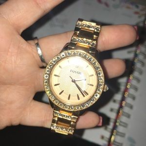 Gold fossil watch